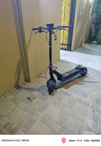 Electric scooter with off-road tires - used, good condition front tire is poped