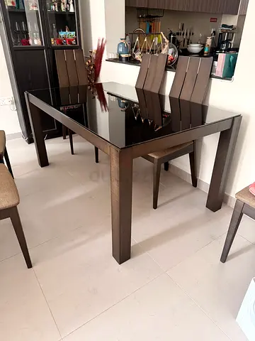 6 seater dining table along with 4 chairs for sale - Excellent condition.