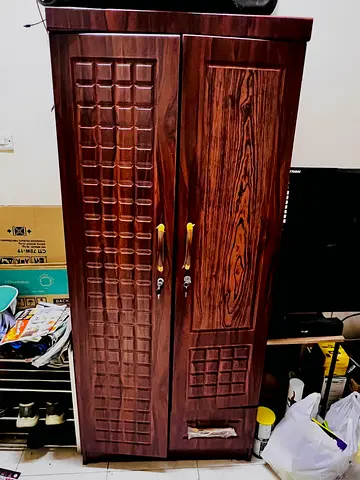 Two-door wooden wardrobe / cupboard in dark finish