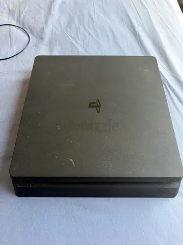 Sony PlayStation 4 Slim with Controller and 6 PlayStation 4 Games - Good Condition