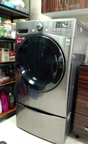 LG 20 kg washer and 9 kg dryer 2 in one new model slightly used with baby washer