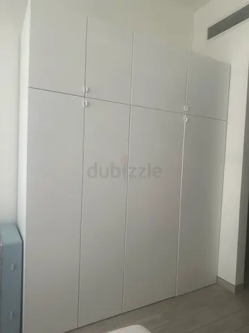 White 4-Door Built-in Wardrobe / Cupboard - Good Condition I buy 4 months before its new
