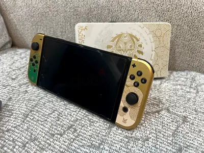 Nintendo Switch OLED Zelda Edition with Custom Gold Joy-Con Covers