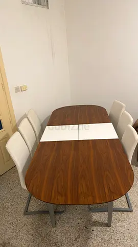 Wood Finish Extendable Dining Table with 6 White Chairs