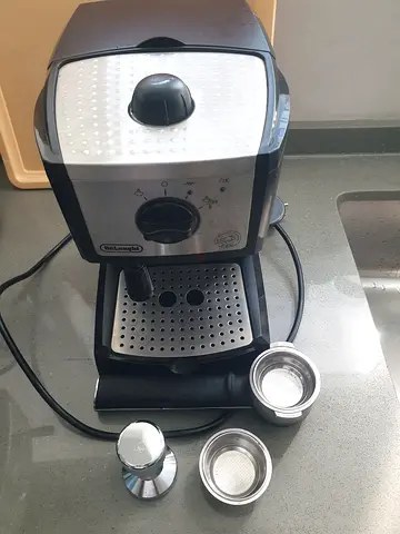 Small Delonghi coffee machine