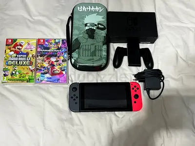 Nintendo Switch console with dock, Joy‑Cons, case and 2 games (Mario Kart & Mario Bros.)