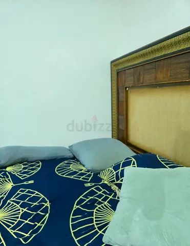 For free -King wooden bed frame with upholstered headboard