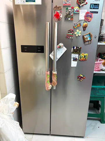 Stainless Steel Side-by-Side Refrigerator - in Excellent Condition as good as new