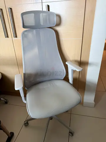 Grey breathable mesh gaming chair with minor wear