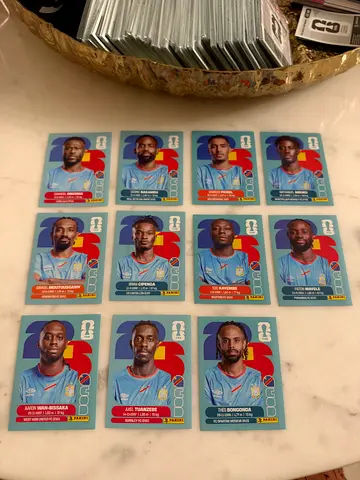 Collection of 11 Panini COD Football Player Sticker Cards