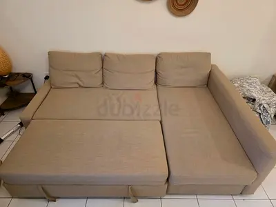 Beige L-shaped Sofa Bed - Good Condition