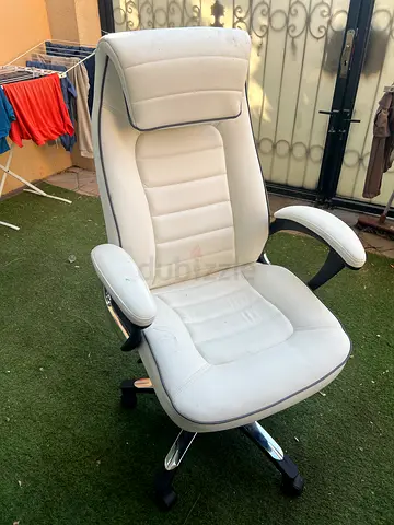 White ergonomic office chair with armrests and headrest - used