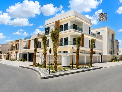 For sale in a prime location, featuring luxury finishes. The property includes: ● Two spacious living areas and a large formal sitting room (majlis)