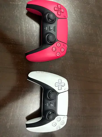 Two Sony PS5 DualSense controllers (White and Pink) - good condition