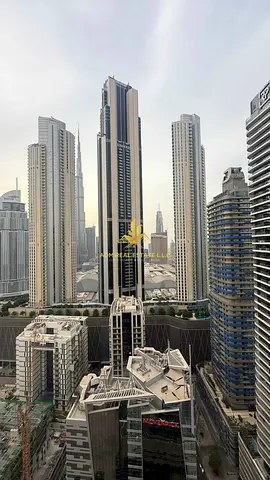 إطلالة على برج خليفة | مفروش بالكامل | معيشة مع تراس | تصميم فريد وواسع | شاغر