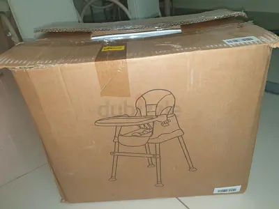 Unopened boxed baby high chair - new in carton