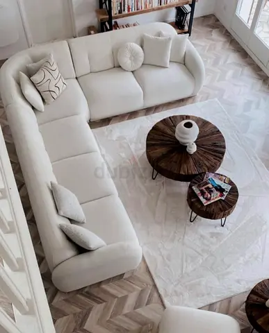 Light beige L-shaped sectional sofa — comfortable 4-seater