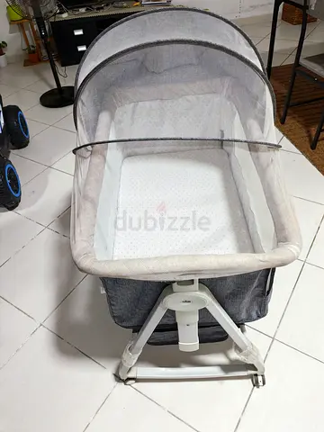 Portable baby bassinet/crib with canopy - grey, gently used
