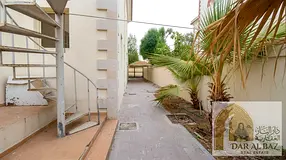 Spacious villa for rent in Al Rifaa, Sharjah, featuring 4 bedrooms, large majlises (reception areas)