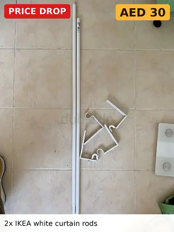 2x IKEA slim white curtain rods with brackets