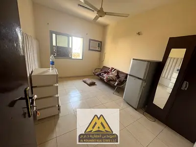 Spacious 2-bedroom in Al Mowaihat 2, Ajman, separate living room, balcony, window AC. AED 32,008 yearly.