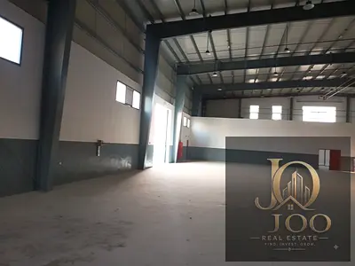 Warehouse with Showroom and Mezzanine for Rent in Umm Al Thaoub – Ready for Immediate Handover