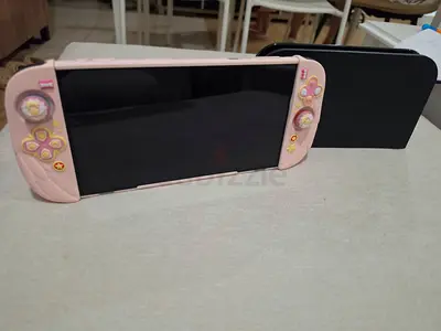 Black Nintendo Switch 2 casing complete set with mario cart and wheel controller - Negotiable