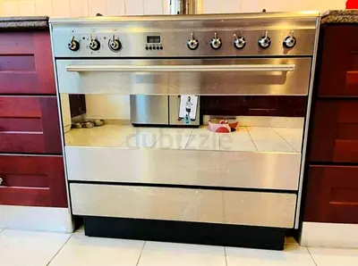 SMEG Dual fan Top Gas oven electric cooking range size 90cm