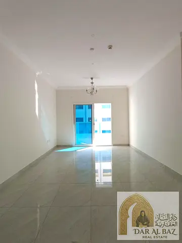 One month free + parking! 3-bedroom apartment with a living room in Al Majaz 2. Features a balcony