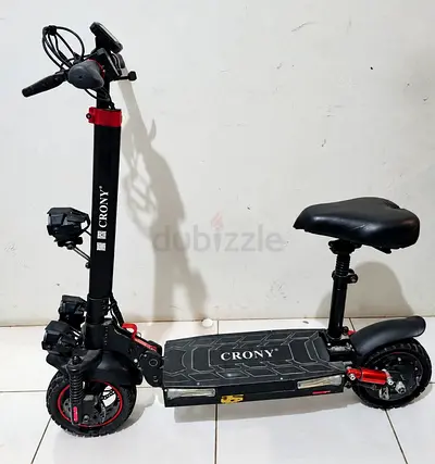 Crony Electric Scooter with Seat — Dual Suspension, Good Condition