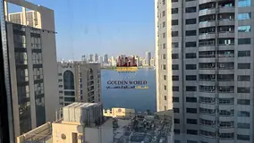 2BR Apartment for Rent in Al Majaz 3 - Direct View of Al Qasba & the Lake | Free Gym, Pool & Parking