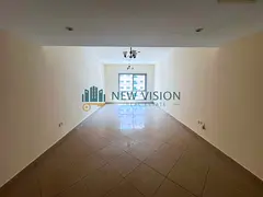 Two rooms with free air conditioning, a balcony, and built-in wall closets; located near the Dubai e