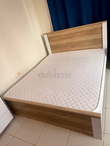 Double wooden bed frame with mattress - good condition, less than 2 years
