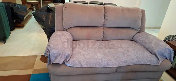 2-seater reclining sofa in beige — good condition