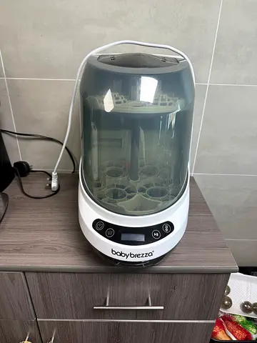 Baby Brezza Bottle Sterilizer and Dryer - Excellent Condition with detergent and descaling tablets