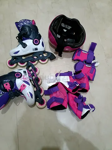 Kids inline skates with helmet and pads - size small