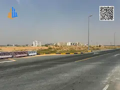 Residential-commercial corner plot for sale in Al Dabdaba South, Sharjah | 3,659 sq. ft. | G+2+M | A