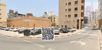 Mixed-use plot for sale in Al Nakheel 2, Ajman. 4,040 sq. ft., corner plot on two streets, ground fl