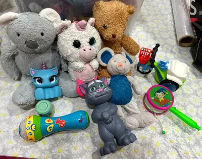 Ten Mixed kids toys bundle — plush animals, figures, instruments and more