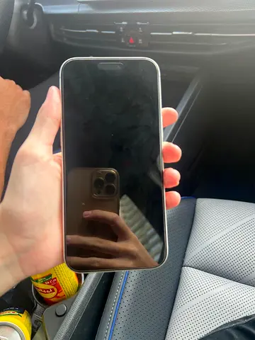 iPhone (good working condition) - silver frame, needs screen clean