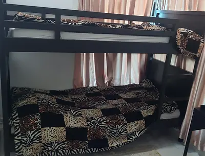 Ikea Solid dark wood bunk bed - ايكيا سرير من طابقين بني غامق