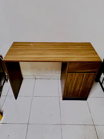 Compact wooden study desk with storage cabinet