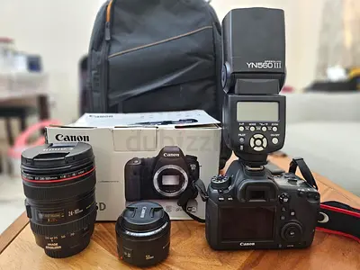 Canon 6D with 24-105mm, 50mm, YN560 III Flash and Backpack