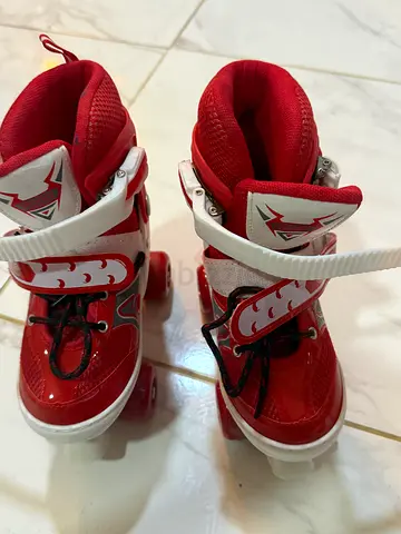 Red Kids Inline Roller Skates, adjustable straps, good condition