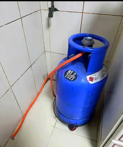 Adnoc LPG Gas Cylinder with regulator and Hose - Gas Stove with 3 burners - Good Condition