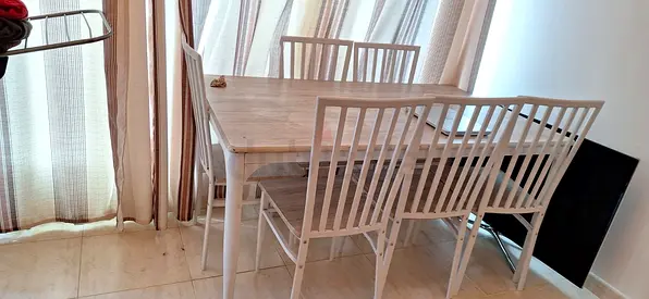 White wooden dining table with 4 matching chairs - used