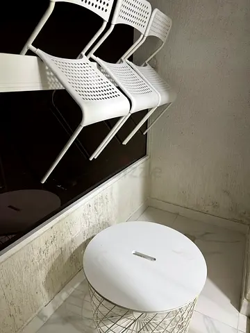 Set of 3 white metal stacking chairs - modern perforated design