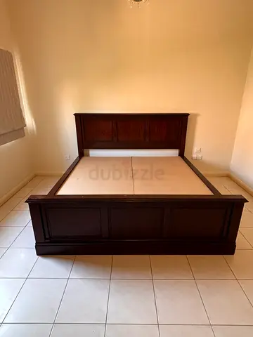 Solid wood Calfornia King bed from Pottery Barn