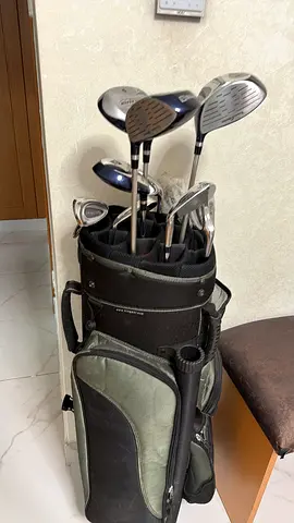Complete set of golf clubs with stand bag — used, good condition