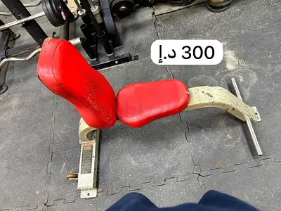 Used adjustable sit-up / abdominal bench with padded seat and back